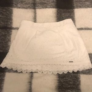 Abercrombie and Fitch white lace mini skirt.